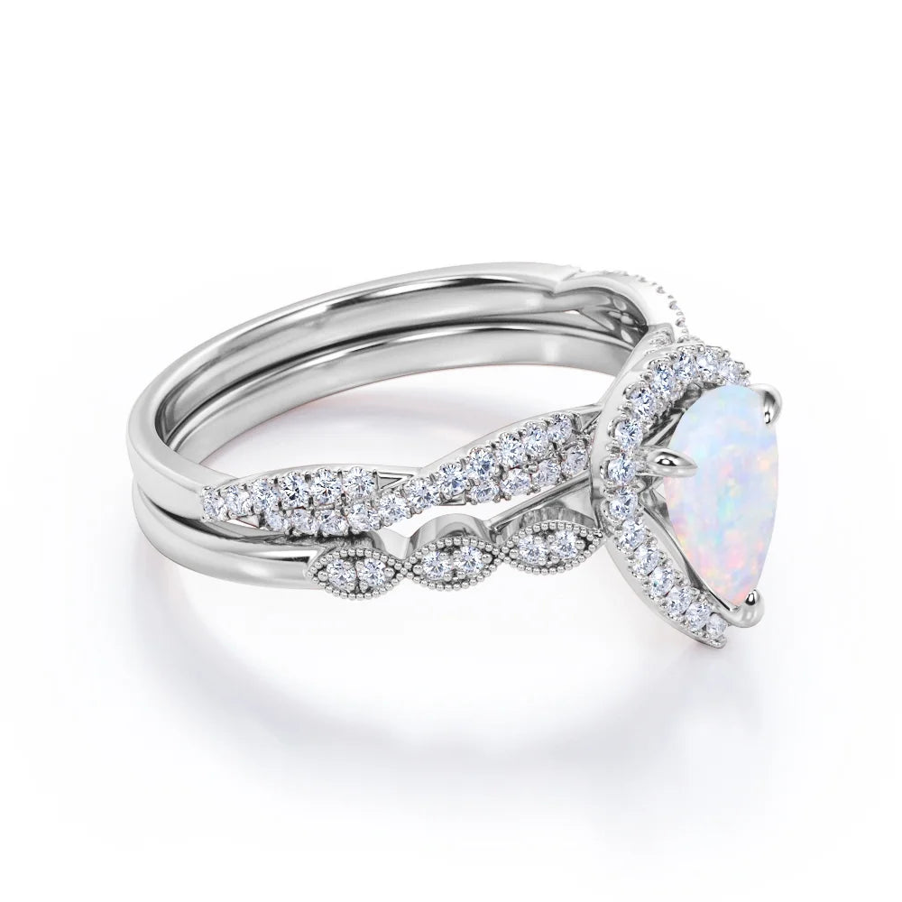 1.5 Carat Pear Cut Birthstone Opal and Moissanite Ring