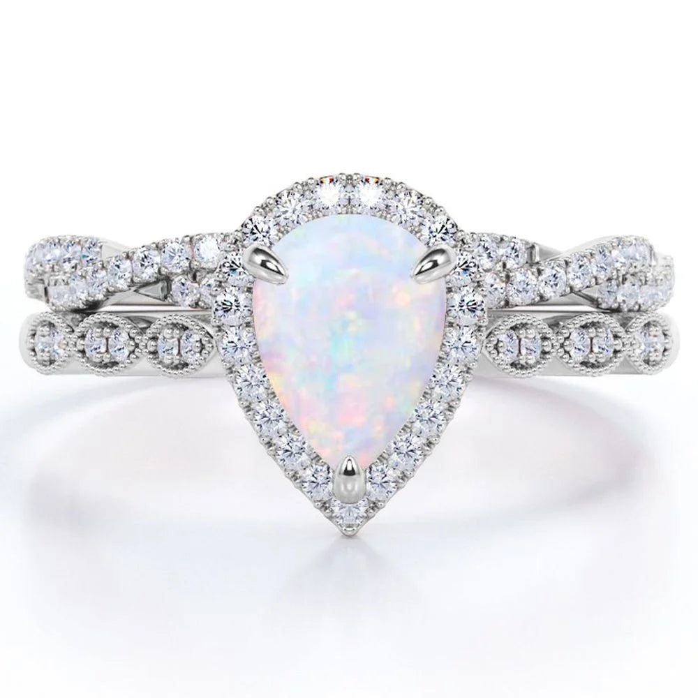 1.5 Carat Pear Cut Birthstone Opal and Moissanite Ring