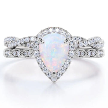 1.5 Carat Pear Cut Birthstone Opal and Moissanite Ring